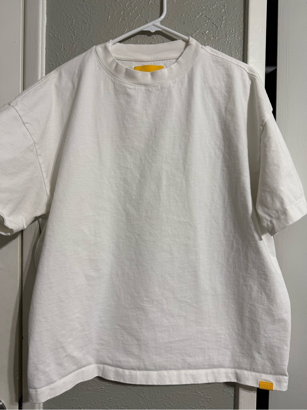 Men's White Short Sleeve Crew Tee with Subtle Yellow Tab